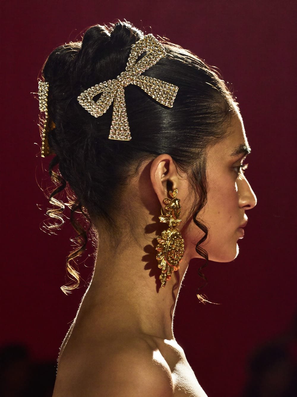 Jewelled bow updo from our hair styling course in Delhi